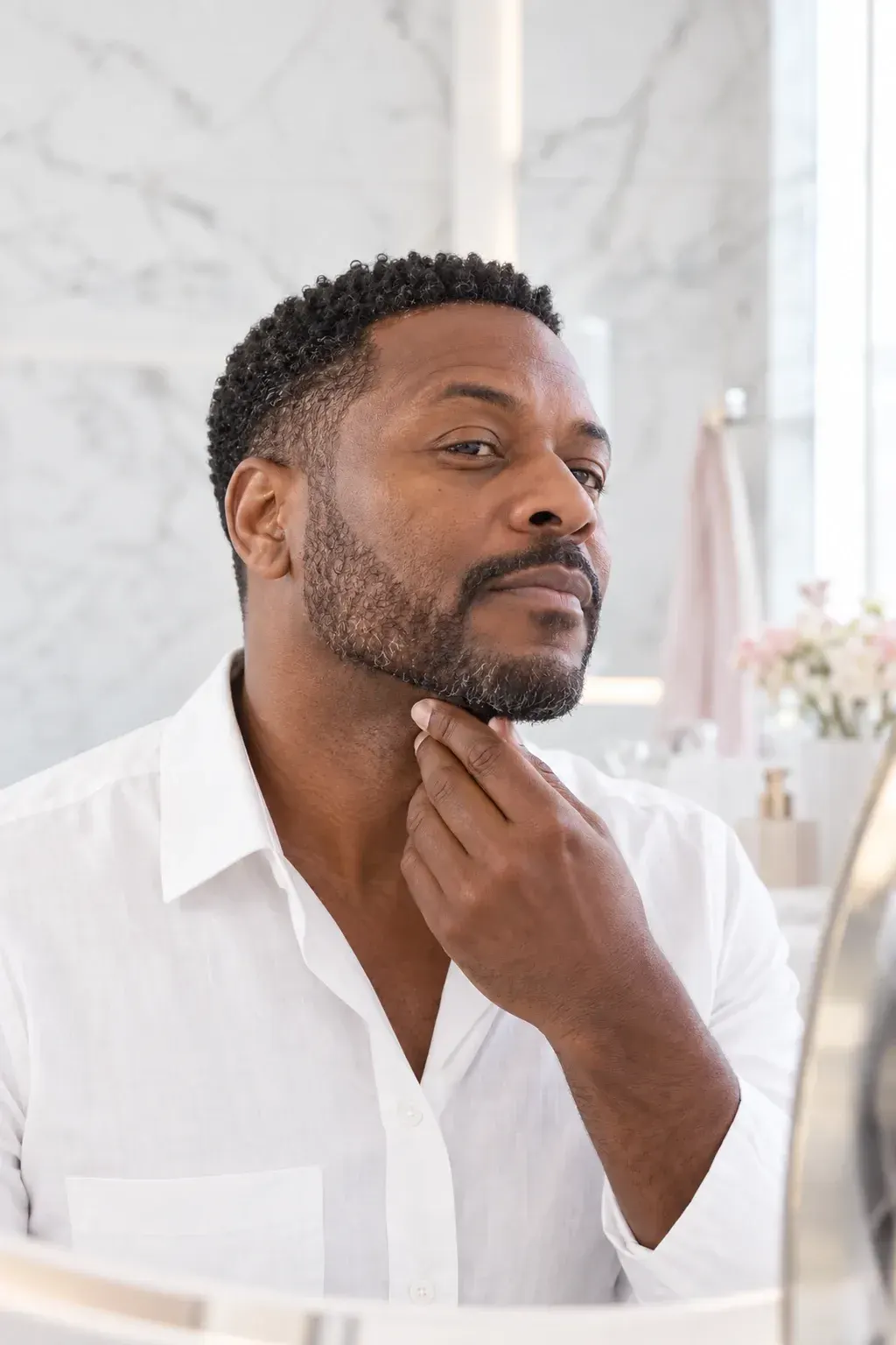 Educational profile view showing loss of jawline definition at Chandra Wellness Ocala